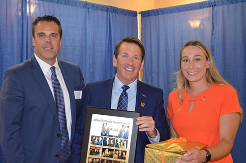 Todd Ferrante, center, with incoming chair, Steve Green, and Caroline Phillips, Development Officer